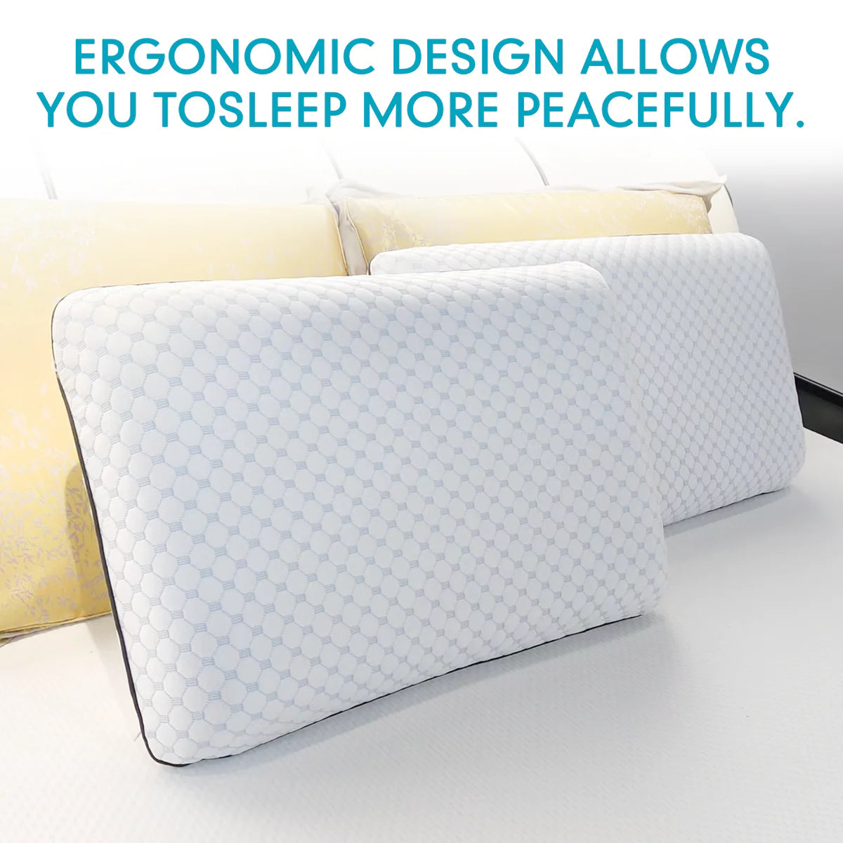 Ergonomic pillow with text 'Ergonomic design allows you to sleep more peacefully' on a blurred bedroom background.